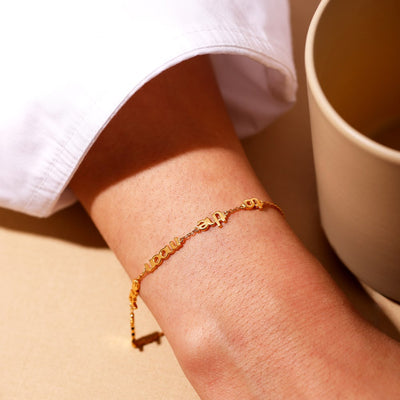 Vocabulary bracelet, gold plated